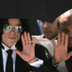Michael Jackson and his father Joe Jackson (R) wave to fans as they exit the court after hearing the jury declare Not Guilty on all counts in the Michael Jackson child molestation trial at the Santa Barbara County Courthouse June 13, 2005 in Santa Maria, California. Jackson was charged in a 10-count indictment with molesting a boy, plying him with liquor and conspiring to commit child abduction, false imprisonment and extortion.